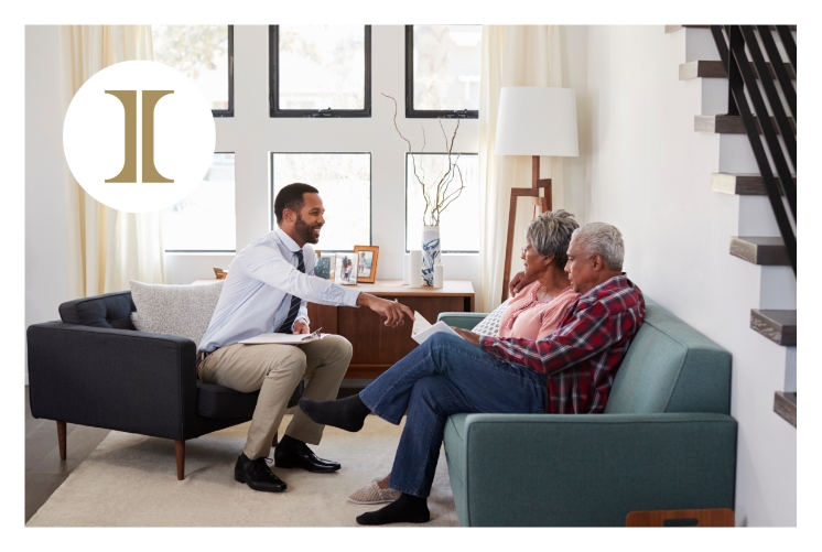 Senior couple talking with an agent