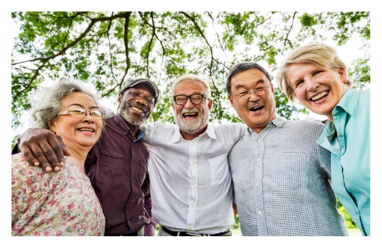 Group of seniors smiling and enjoy the outdoors